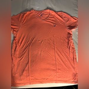 Men's salmon colored American eagle Tshirt in size xxl, no rips or stains.